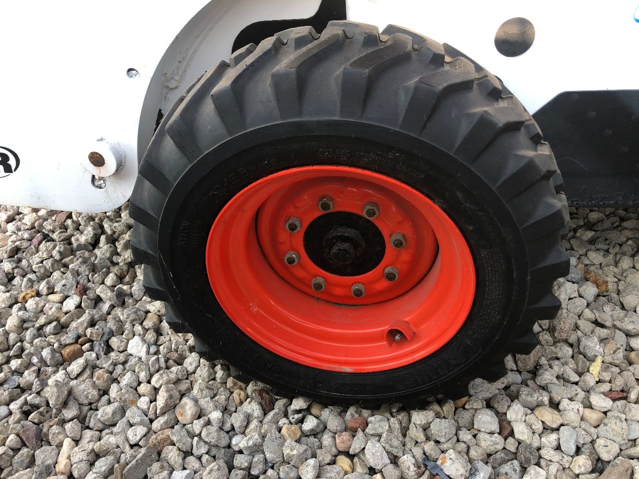 Bobcat S205 Tire and Rim for Sale