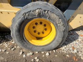 Gehl SL7810 Left/Driver Tire and Rim - Used