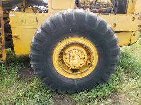 International H-90E Left/Driver Tire and Rim - Used