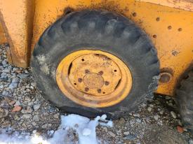 Case 1830 Right/Passenger Tire and Rim - Used
