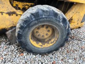 Gehl SL7810 Left/Driver Tire and Rim - Used