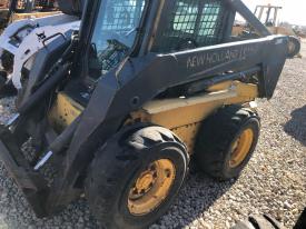 New Holland LS180 Loader Arm - Used | P/N 87057630