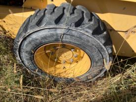 New Holland LX565 Right/Passenger Tire and Rim - Used | P/N 2147165