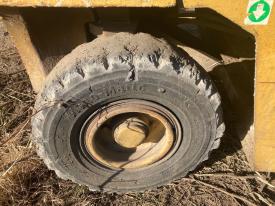 CAT VC60D Right/Passenger Tire and Rim - Used