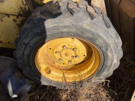 New Holland L553 Right/Passenger Tire and Rim - Used