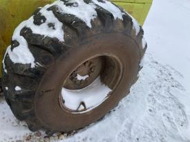 International 515 Left/Driver Tire and Rim - Used