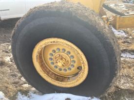 John Deere 770BH Left/Driver Tire and Rim - Used