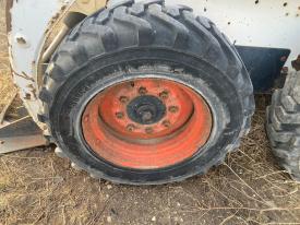 Bobcat 751 Left/Driver Tire and Rim - Used