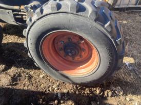 Bobcat S220 Right/Passenger Tire and Rim - Used