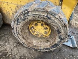 Gehl R165 Right/Passenger Tire and Rim - Used