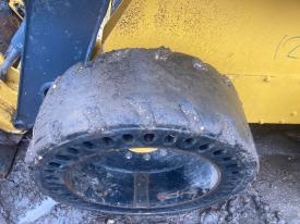John Deere 326E Tire and Rim - Used