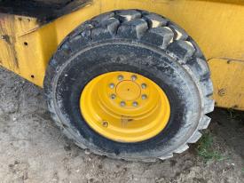 John Deere 330G Right/Passenger Tire and Rim - Used