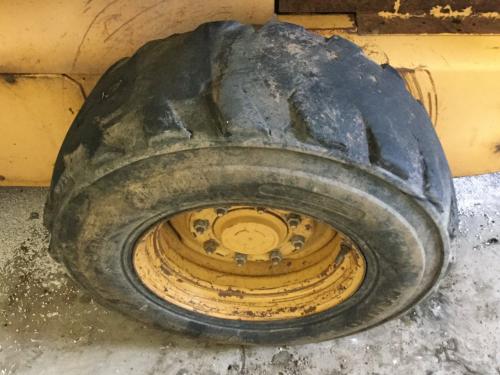 1998 New Holland LX865 Left Tire And Rim