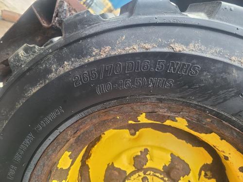 2000 New Holland LS150 Left Tire And Rim