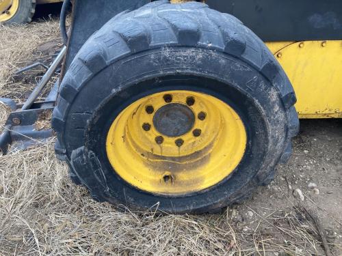2008 New Holland L185 Left Tire And Rim